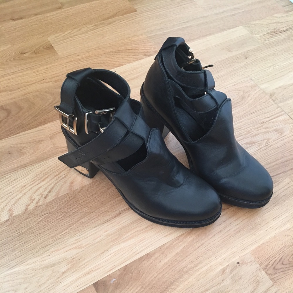 TopShop black leather booties with gold buckles